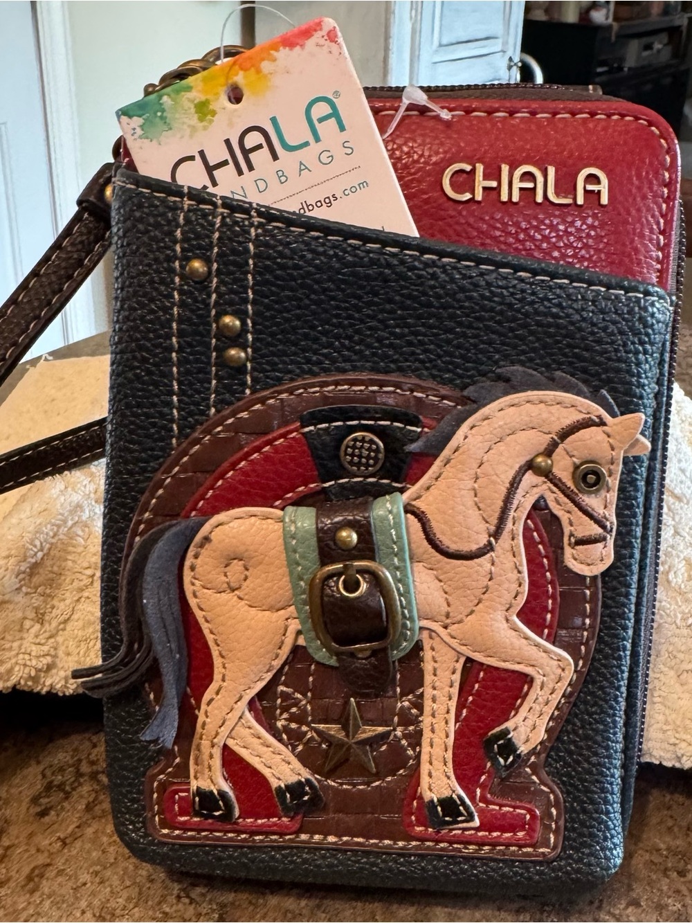 CHALA Navy Pebbled Leather Crossbody/Wristlet with Multi‑Color Horse Applique